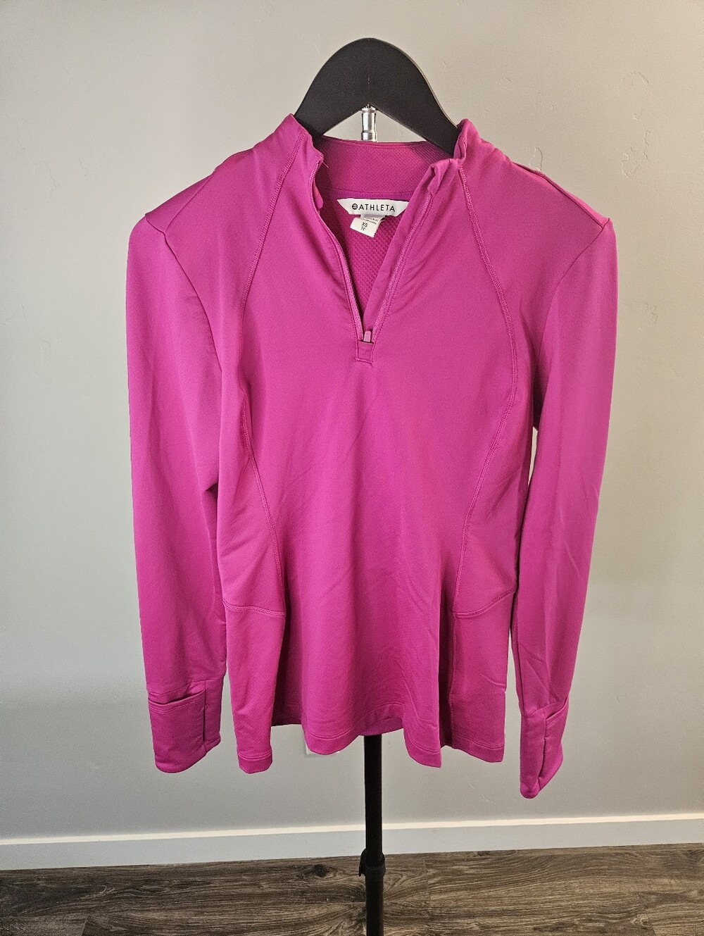 Athleta fuchsia pink long-sleeve quarter-zip athletic top with thumbholes